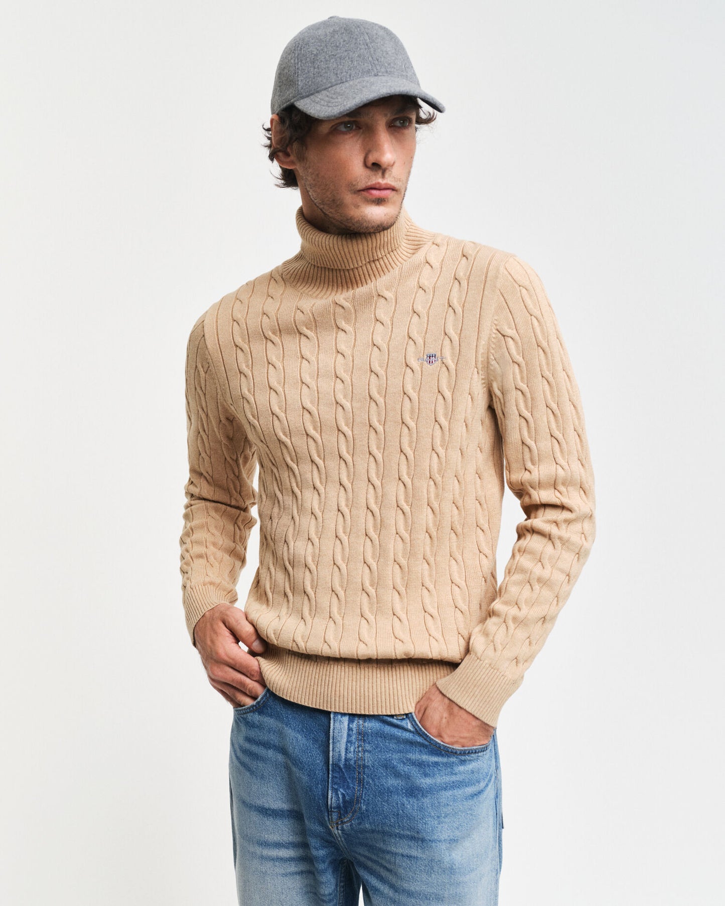 Baumwollrollkragenpullover mit Zopfmuster