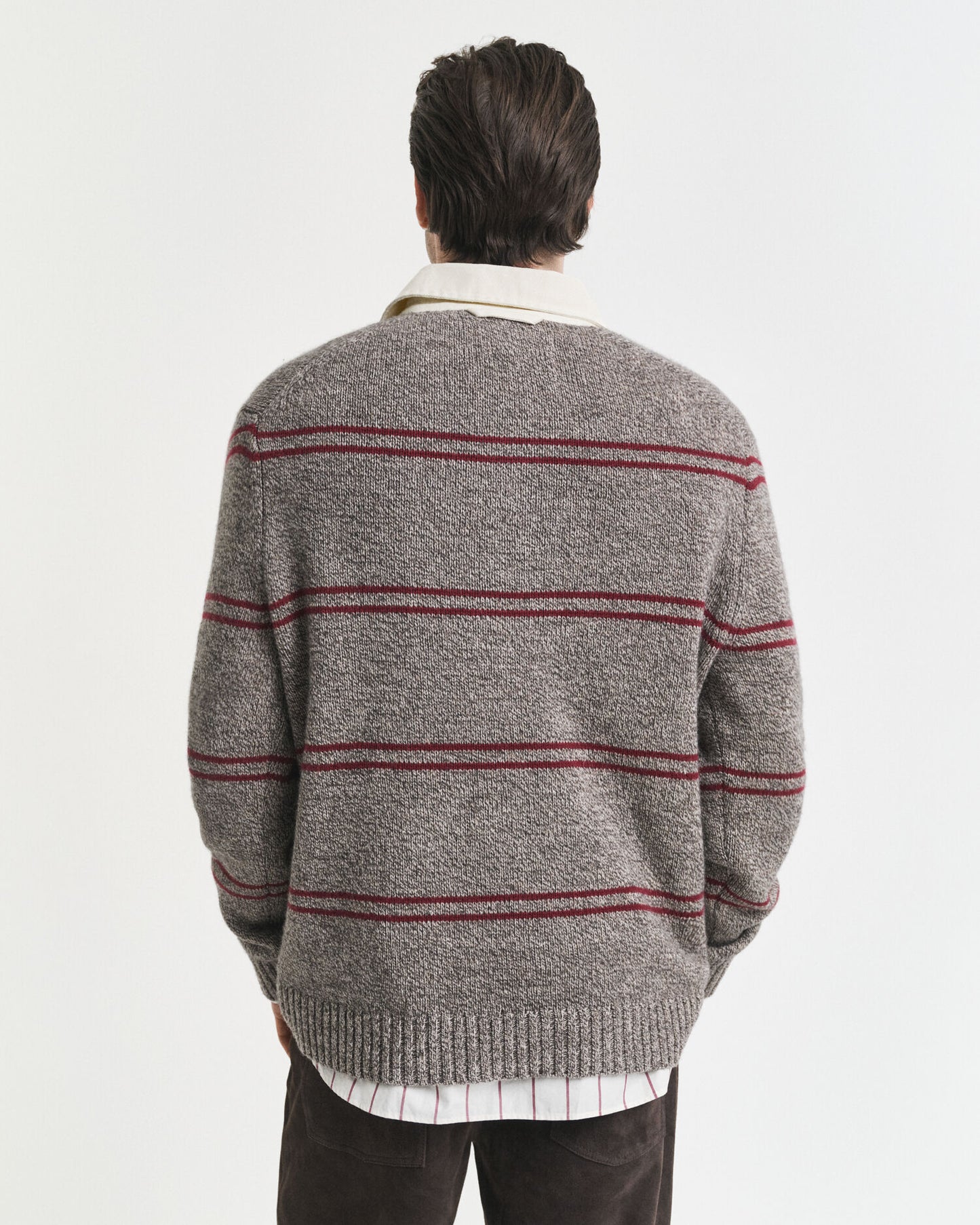 Pull polo en maille de laine mélangée à rayures