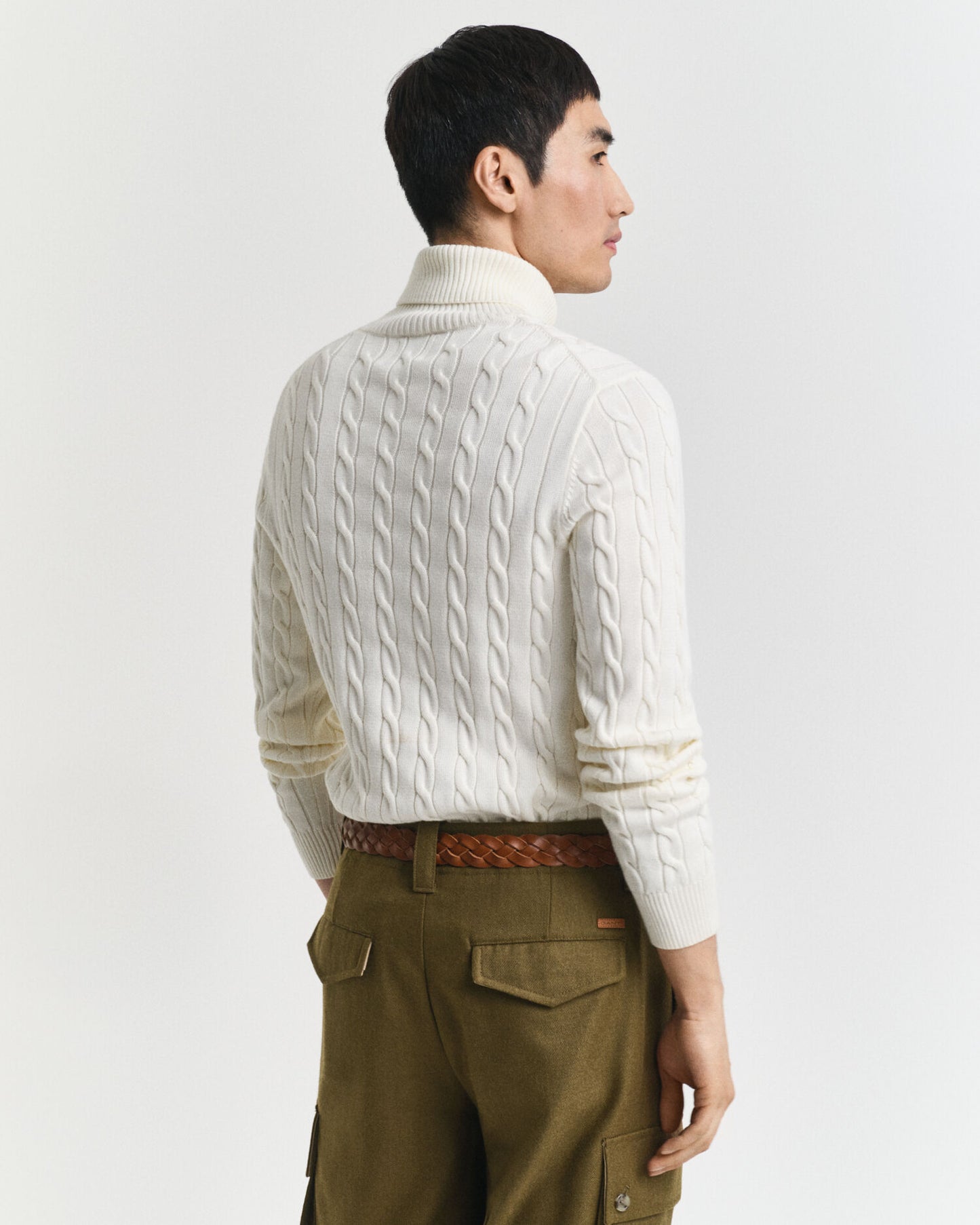 Baumwollrollkragenpullover mit Zopfmuster